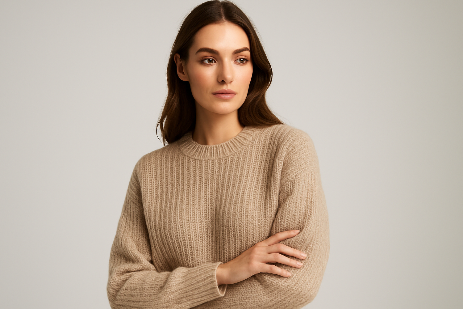 women model waring beige knit light grey background photo studio